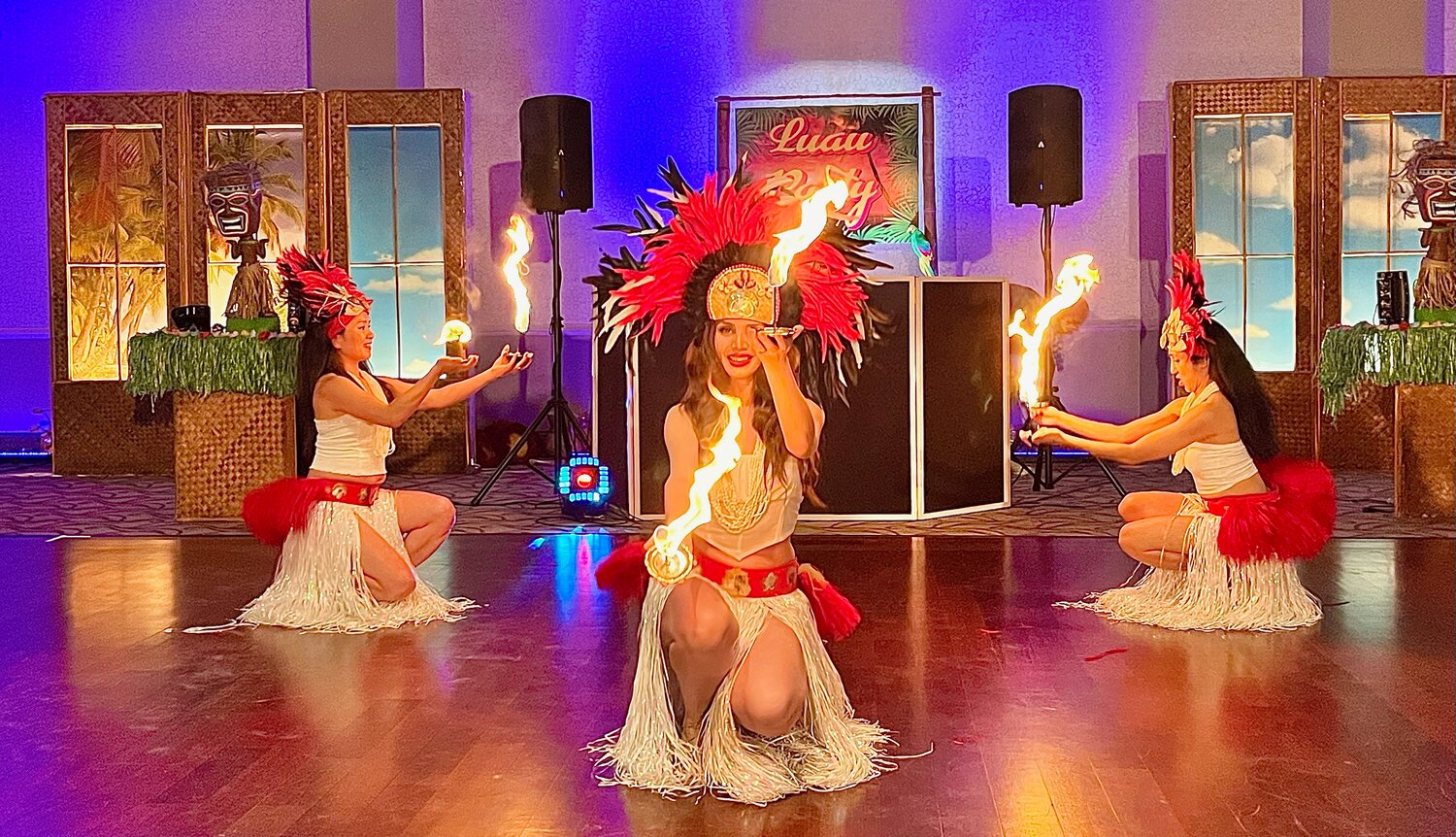I was looking forward to seeing the floor show, having never been to an actual luau, and was not disappointed as the décor and entertainment were provided by Perry Gips and his team from Party Master.